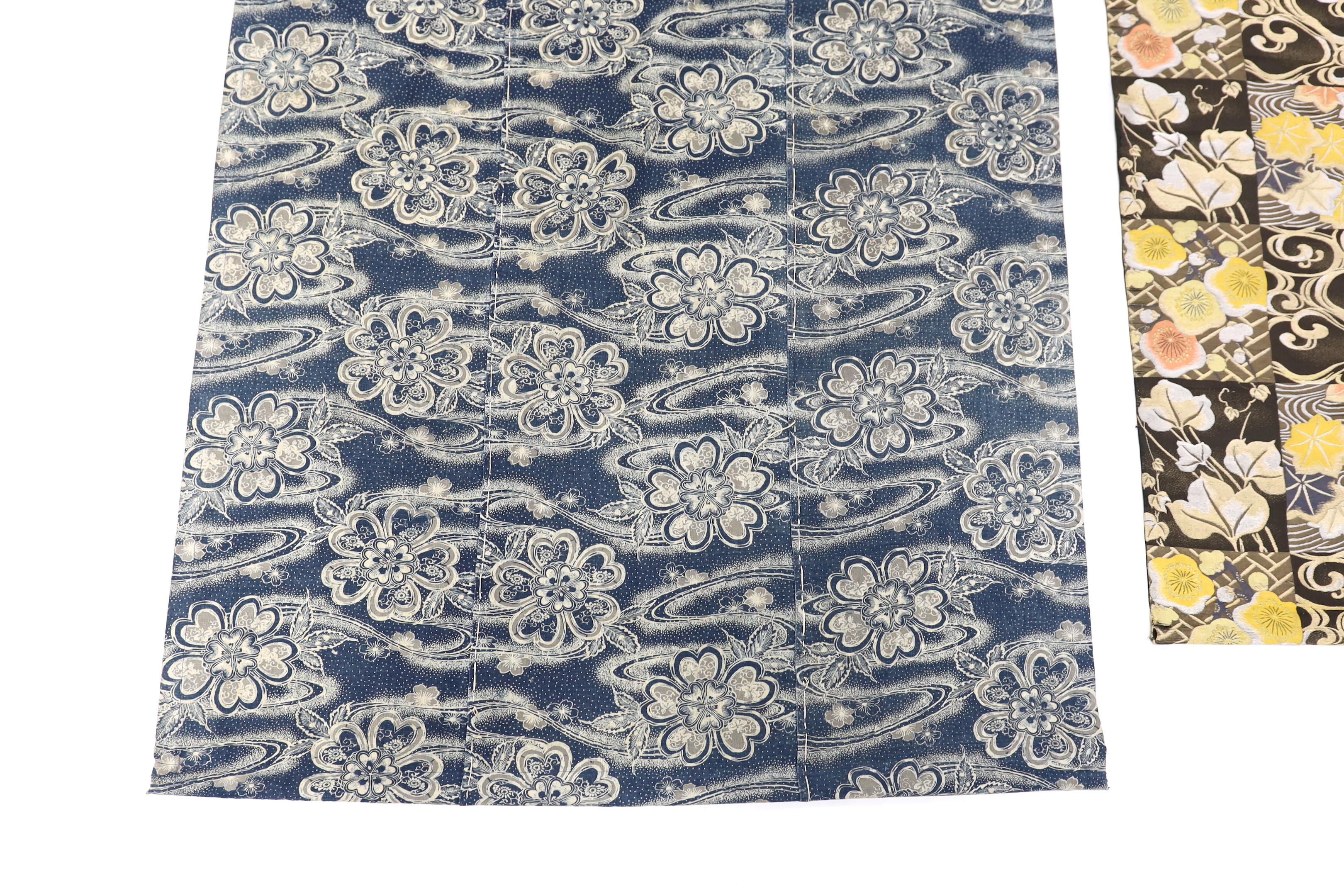 A Japanese blue-printed banner and part of a Japanese silk brocade Obi converted to a hanging, Obi 110cm long, (2)